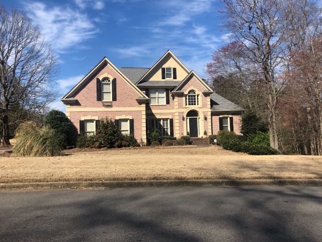 brick home in alpharetta that was repainted by certapro painters of roswell