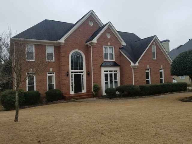 photo of repainted exterior of brick home in alpharetta Preview Image 1