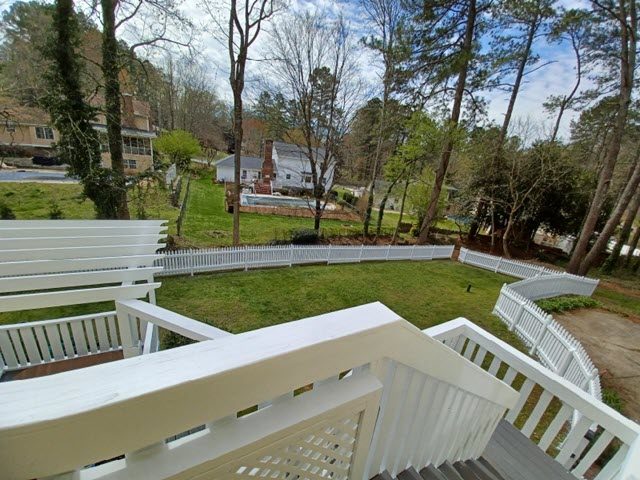 photo of repainted deck, fence, and pergola Preview Image 1