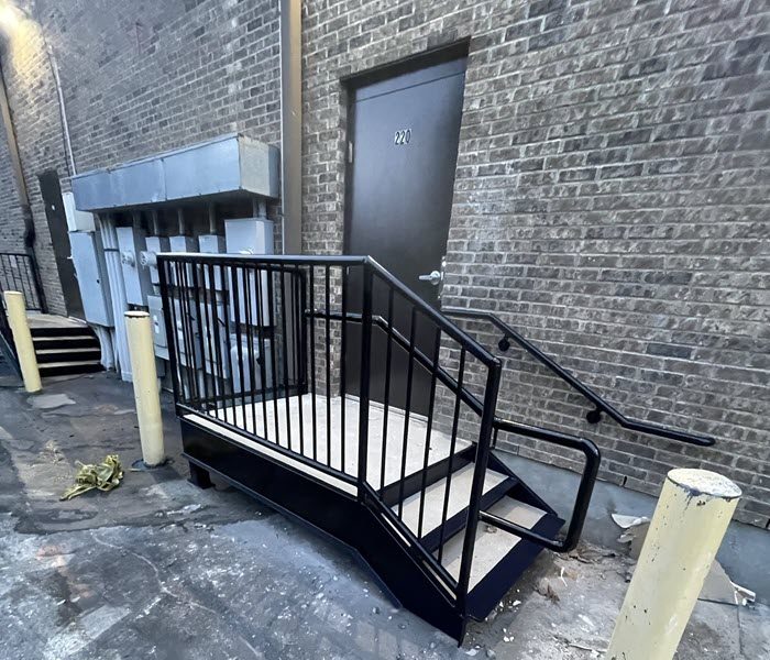 photo of repainted commercial door, stairs, and railing Preview Image 1