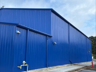 commercial building exterior after blue repaint project
