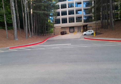 photo of repainted red fire lane curb in alpharetta