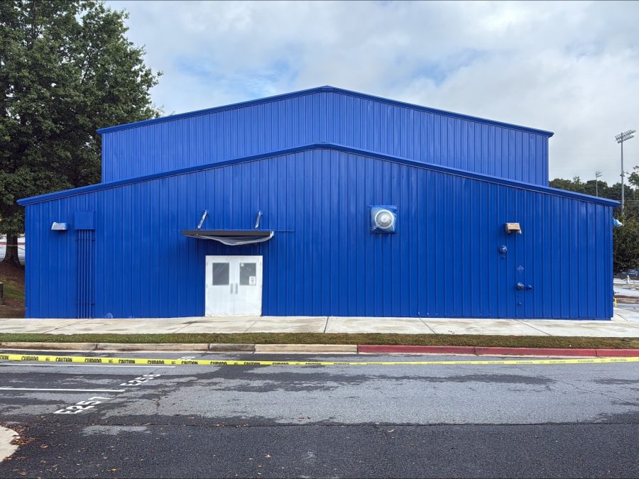 school building with painted blue exterior Preview Image 1