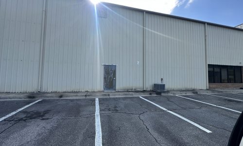 Damaged Metal Siding & Doors