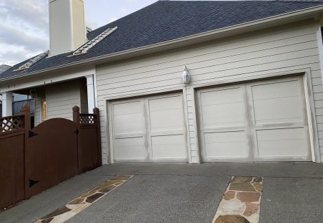 exterior of home garage painting in progress