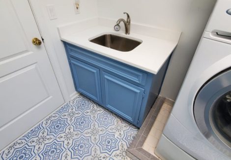 repainted cabinet in laundry room of a house in alpharetta, georgia