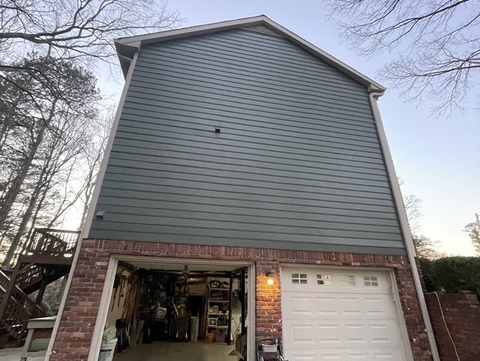 Photo of painted siding above garage Preview Image 7
