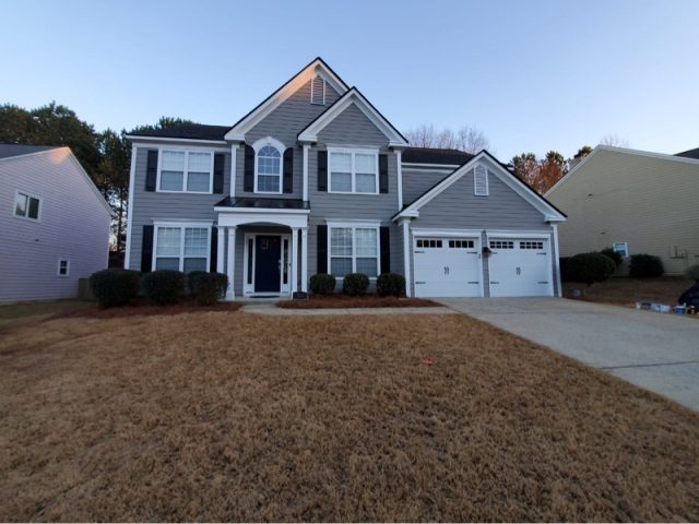 photo of home with repainted exterior Preview Image 7