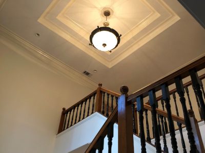 repainted hallway and ceiling near staircase inside house in marietta, georgia