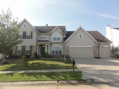 Exterior painting by CertaPro house painters in O'Fallon / Dardenne, MO