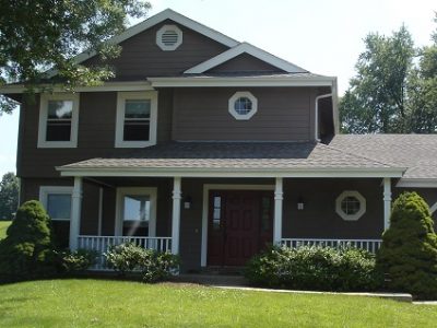Exterior house painting by CertaPro house painters in St. Peters, MO