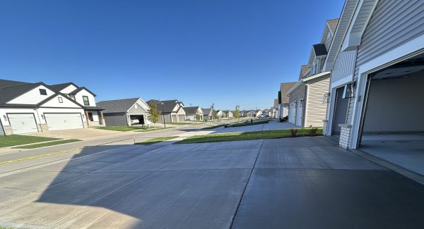 Residential Driveway Project With Gloss Finish Sealant in St, Charles, MO