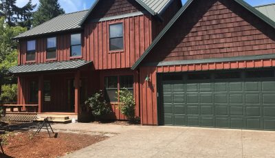 red wood home exterior painting