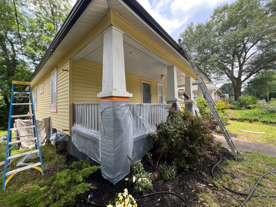 house exterior with yellow siding prepped for painting Preview Image 10