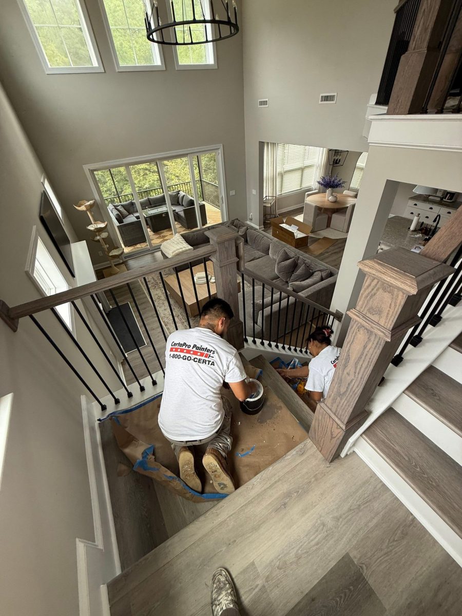 painters staining wooden staircase railing Preview Image 9
