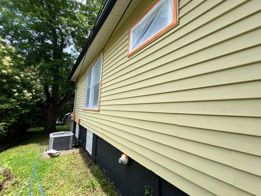 house exterior with yellow siding prepped for painting Preview Image 13