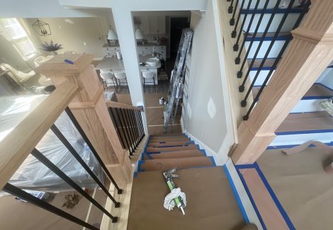 home staircase prepped during repaint