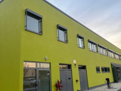yellow painted commercial building exterior
