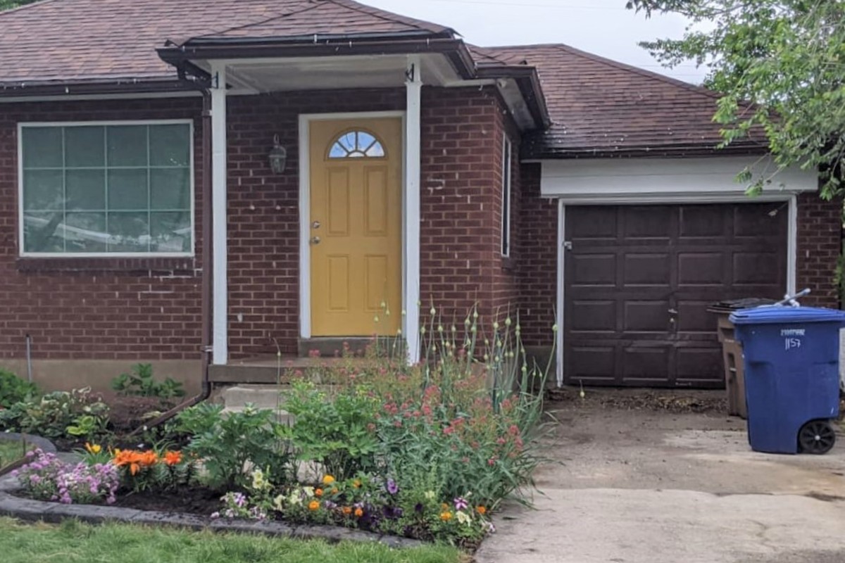 Brick home before painting