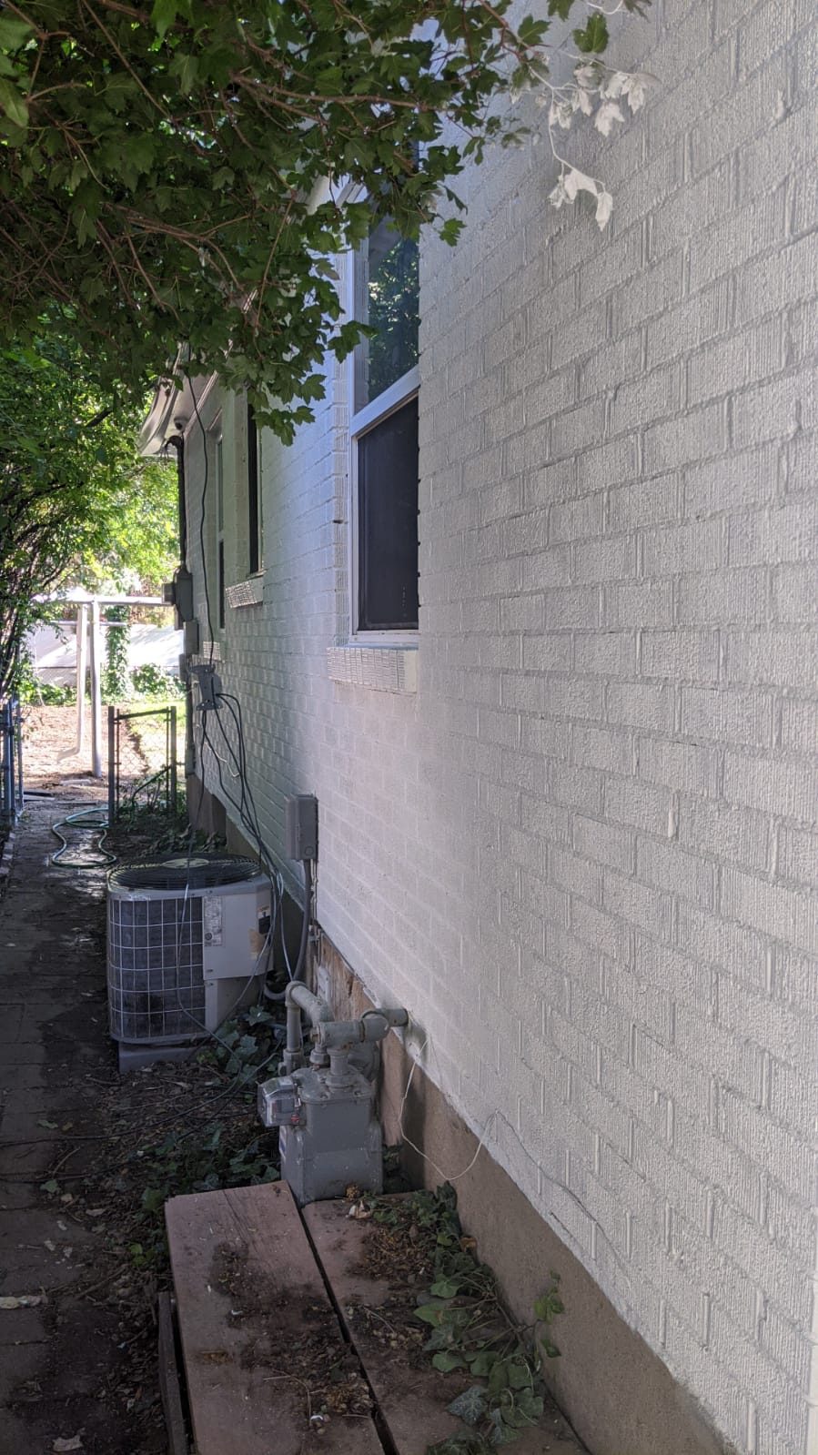 Brick siding repainted white Preview Image 5