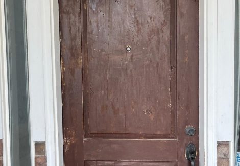 front door with chipped paint