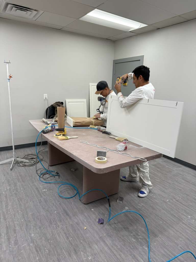 painter spraying cabinets Preview Image 1