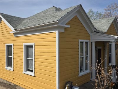 yellow painted house exterior