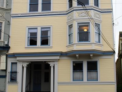 Yellow multi story property in Noe Valley