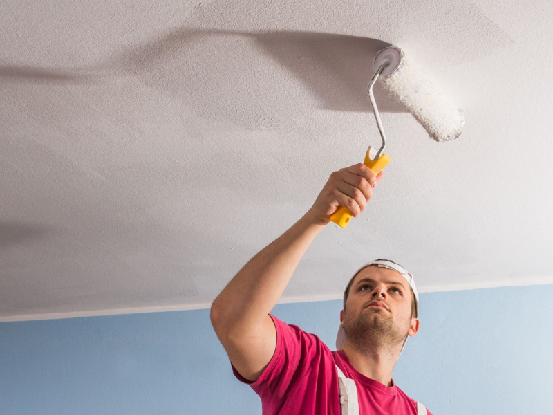 certapro painter team member ceiling painting