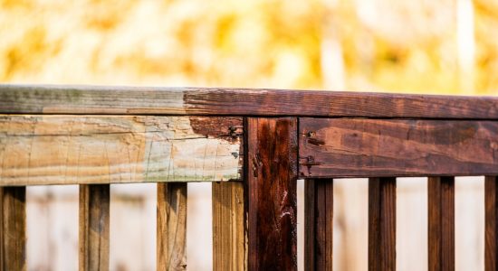 stain applied to deck railing