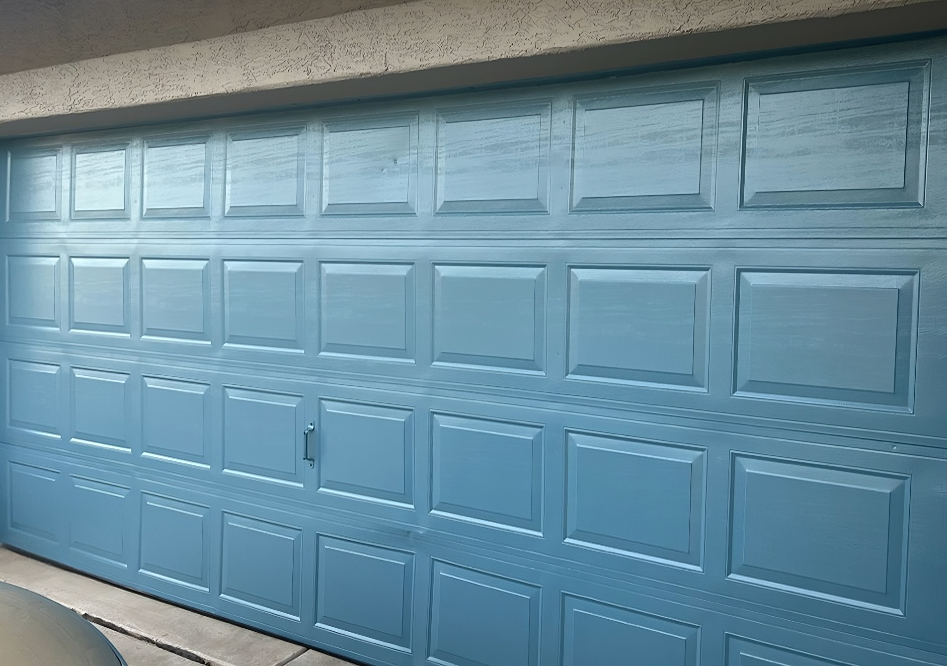 Peach Garage Door Repainted Blue After