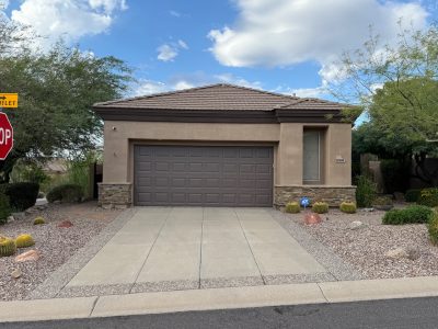 home garage door and driveway after repaint