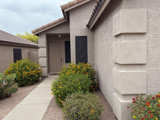 exterior of painted stucco house