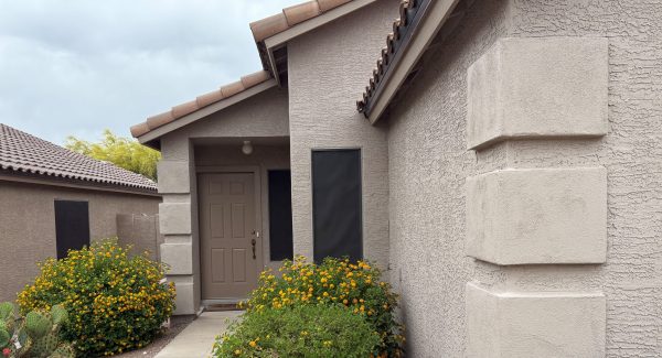 exterior of painted stucco house