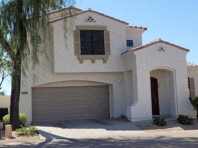 Exterior of house in Phoenix with painted stucco exterior.