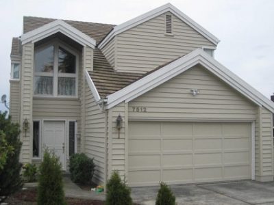 Exterior house painting by CertaPro painters in West Seattle, WA