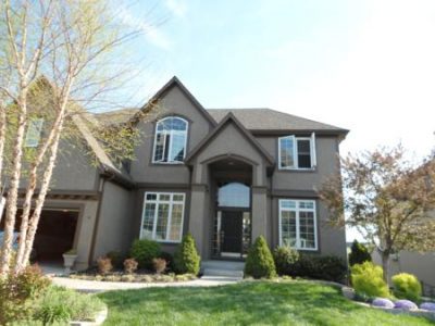 Exterior house painting in Shawnee, KS by CertaPro Painters in Shawnee MIssion