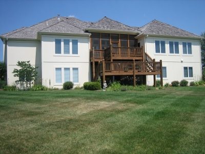 Exterior painting by CertaPro house painters in Lenexa, KS