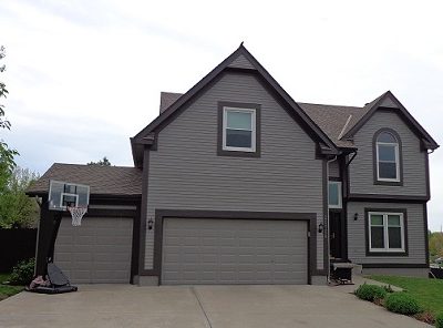 Exterior painting by CertaPro house painters in Shawnee, KS