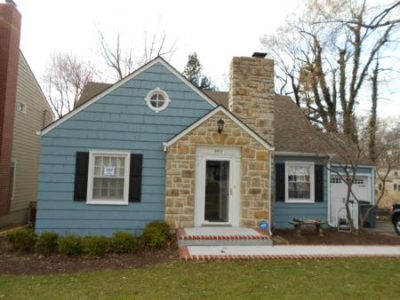 Exterior painting by CertaPro house painters in Shawnee, KS