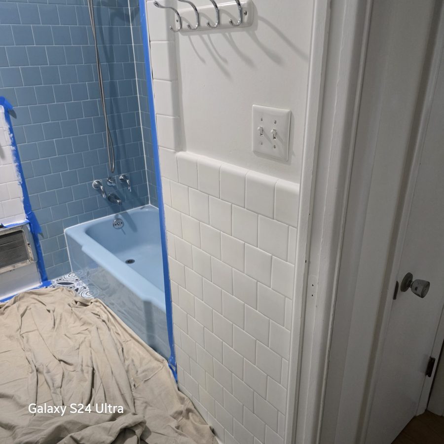 home bathroom with painters tape during paint project Preview Image 11