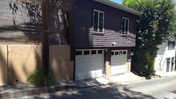 Before Repaint Brown Exterior House in Hollywood Hills