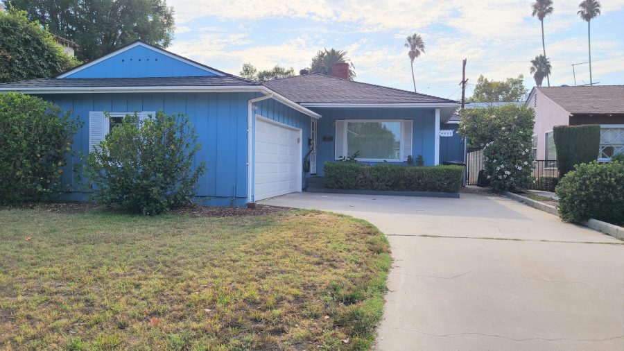 After the house was painted a bright blue. Preview Image 2