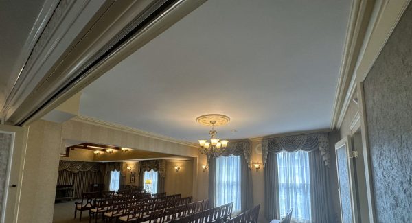 Ceiling repair and repainting at a funeral home in Wallingford.