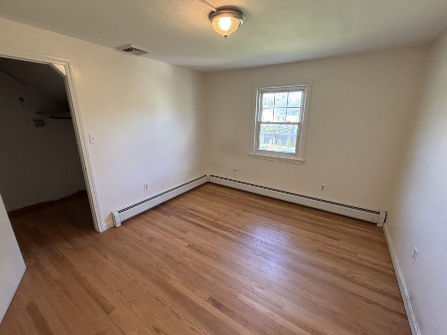 interior room in house with wooden floors and dirty and worn paint on walls Preview Image 13