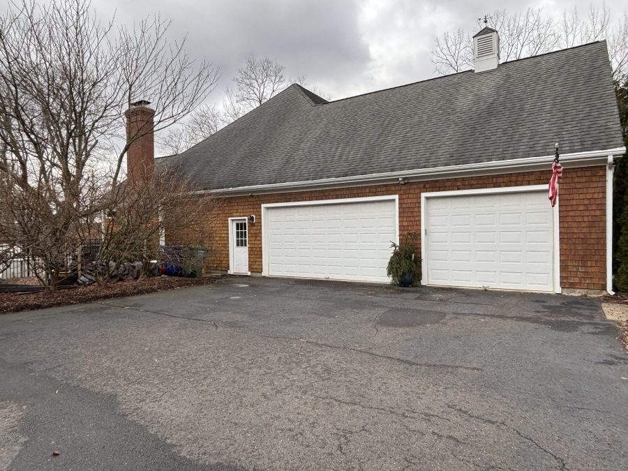 driveway and double garage doors on side of house Preview Image 4
