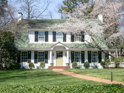 White 3-bedrooom colonial home with black shutters