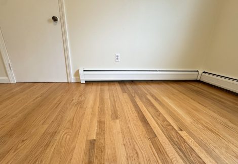 painted interior room in house with wooden floors