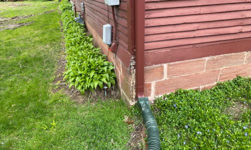 Care was also needed to avoid getting any paint on the natural stone foundation.