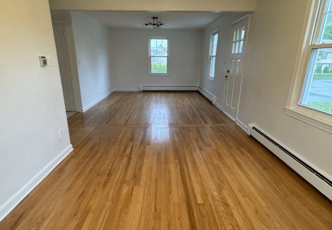 painted interior room in house with wooden floors